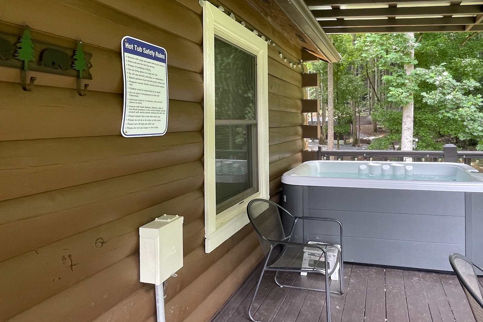 Covered deck with private hot tub