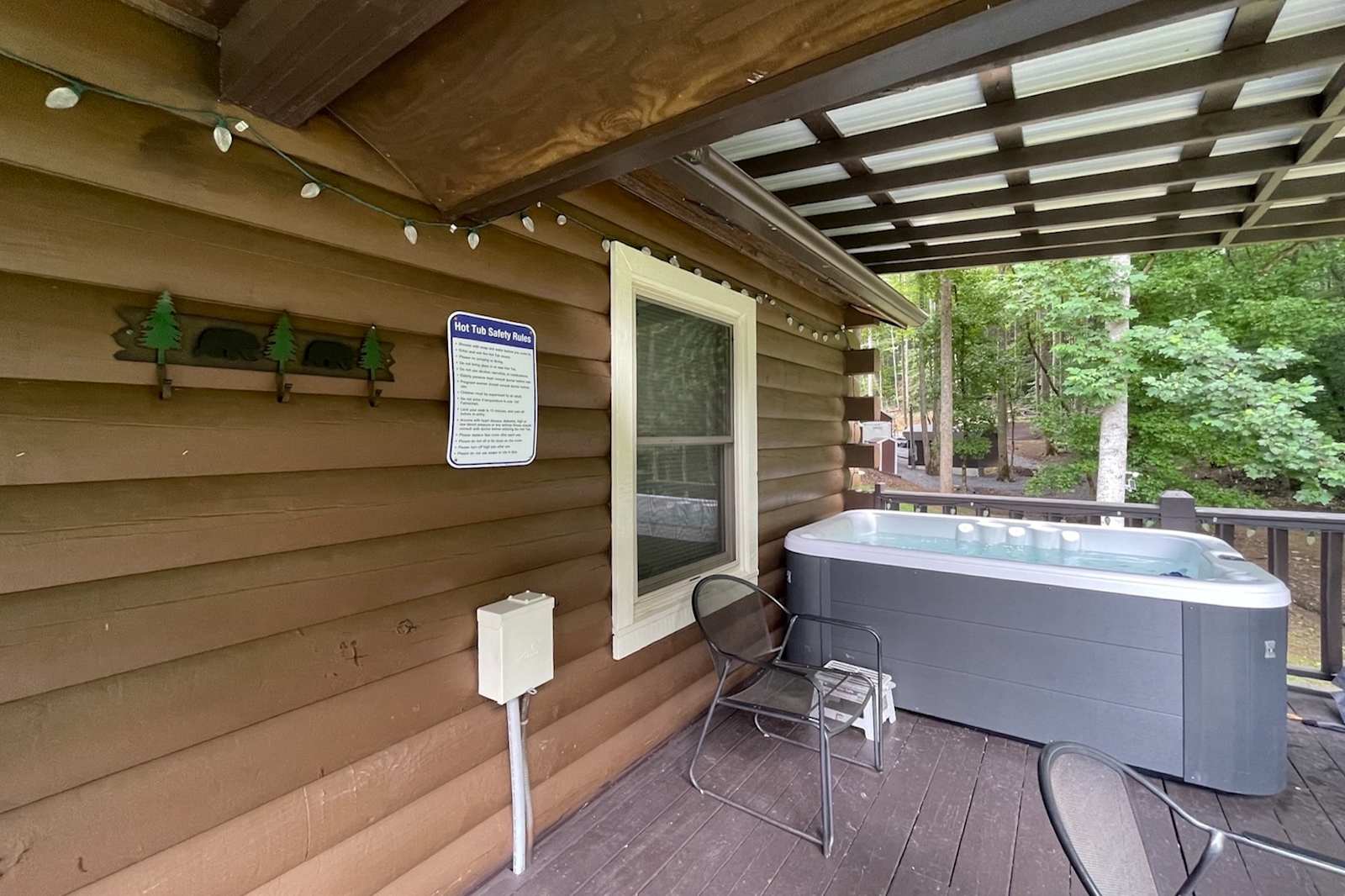 Covered deck and hot tub